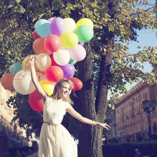 Woman with colorful balloons - Photo, Image