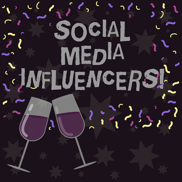 Conceptual hand writing showing Social Media Influencers. Business photo showcasing showing who have a reputation for their knowledge Filled Wine Glass for Celebration with Scattered Confetti. - Photo, Image