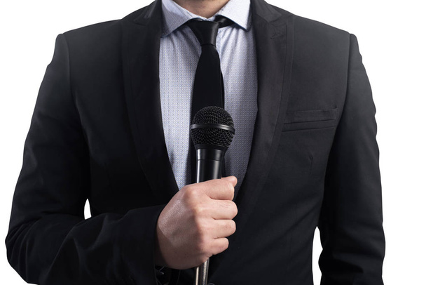 elegant Businessman ready to speak with microphone - Foto, afbeelding
