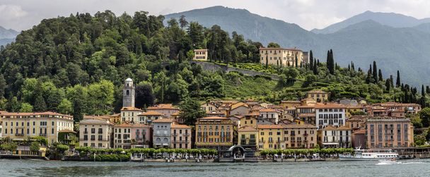 Cityscape with luxury buildings and harbor, Bellagio, lake Como, Lombardy region, Italy, Europe - Фото, изображение