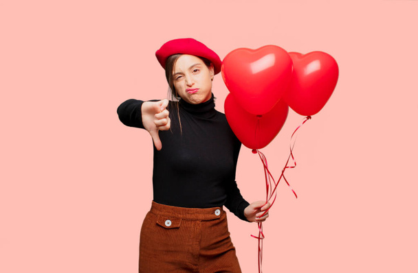 Young pretty woman with expressing love. Concept for Valentines Day. - Photo, image