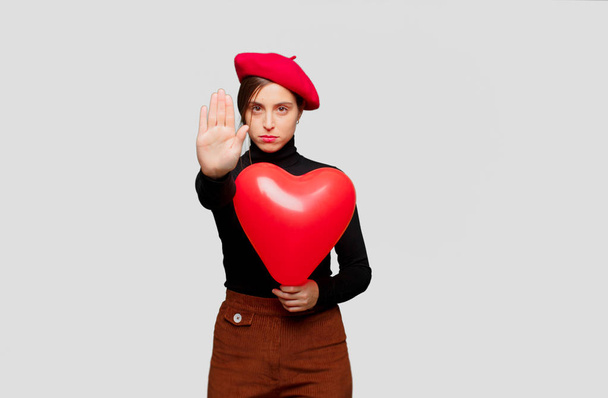 Young pretty woman with expressing love. Concept for Valentines Day. - Foto, afbeelding