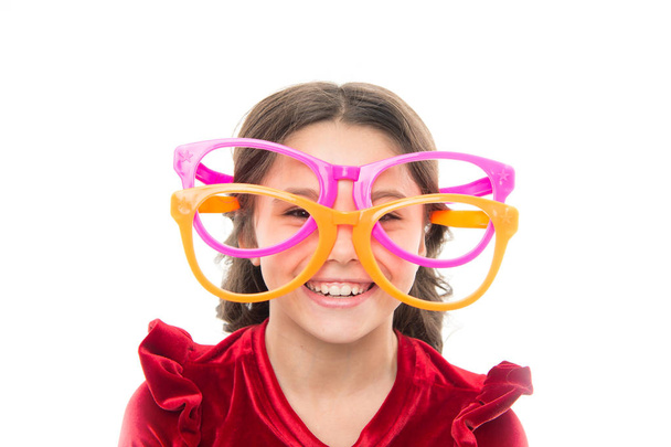 Laser correction. Eye exercises to improve eyesight. Girl kid wear big eyeglasses. Eyesight and health. Optics and eyesight treatment. Effective exercise eyes zooming. Child happy with good eyesight - Fotografie, Obrázek