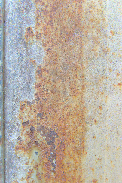 Painted rusty surface. Corrosion of metal. Iron texture. rust corrosion background. Rusty metallic peeling paint. - Photo, Image