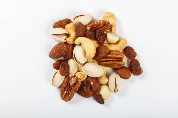 Mixed nuts snacks  isolated on white background.  - Photo, Image