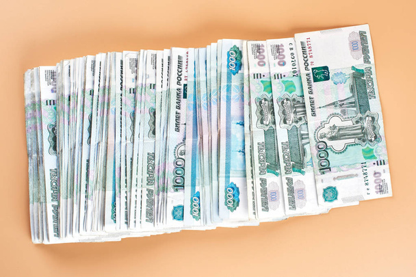 Rubles. Russian paper money on a beige background - Foto, Imagem