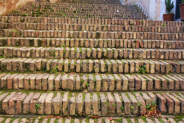 Steps of old bricks in Trastevere, Rome, Italy
 . - Фото, изображение