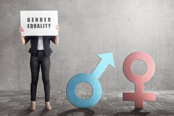Business woman showing symbol of gender equality in the white banner. Equality gender concept - Photo, Image