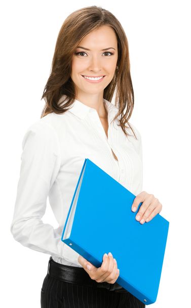 Smiling businesswoman with blue folder, isolated - 写真・画像