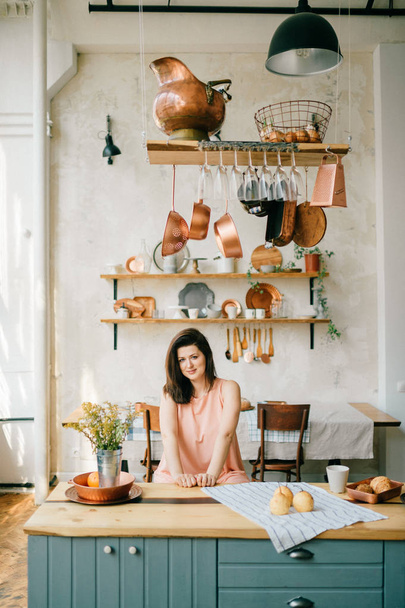 young beautiful woman in kitchen at home - Foto, imagen
