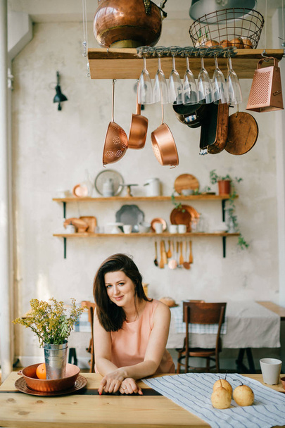 young beautiful woman in kitchen at home - Foto, Imagem