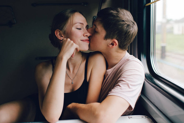 romantic couple of lovers travelling by train - Photo, image