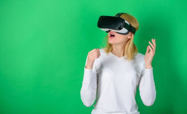 Funny young woman with VR. The woman with glasses of virtual reality. Woman using virtual reality headset. Virtual reality. - Foto, Bild