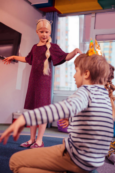 Amazing longhaired little female dancing with classmates - Valokuva, kuva