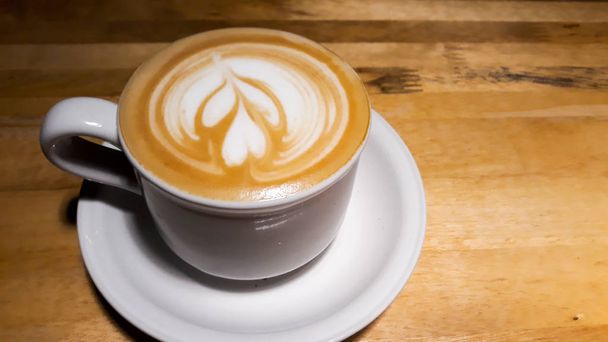 Close-up shot koffie kopje latte art - Foto, afbeelding