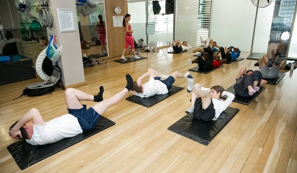 Johannesburg, South Africa - September 09 2013: Diverse Group of young people at a Pilates Class - Φωτογραφία, εικόνα