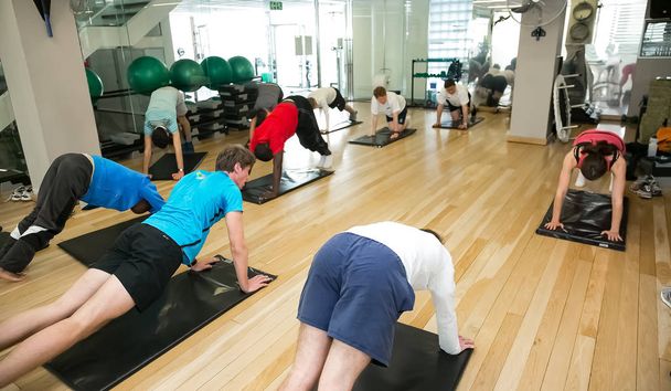 Johannesburg, South Africa - September 09 2013: Diverse Group of young people at a Pilates Class - Φωτογραφία, εικόνα
