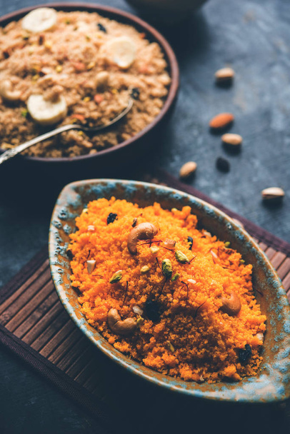 Badaam kesar shira / Sheera or almond saffron halwa, popular Indian dessert served in a bowl. selective focus - Foto, afbeelding