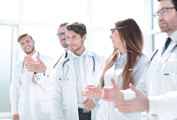 group of successful doctors applauds - Foto, Imagen