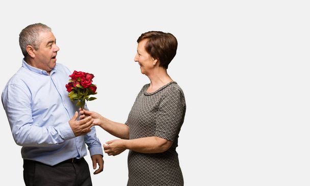 Middle aged couple celebrating valentines day - Фото, изображение