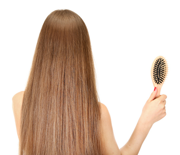 Portrait of beautiful woman with long hair and a hairbrush, isolated on white - Φωτογραφία, εικόνα