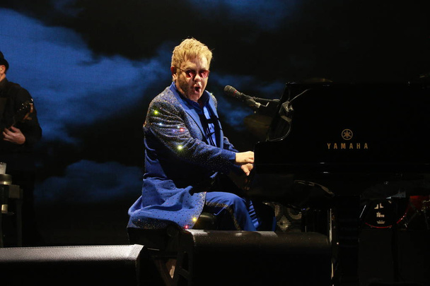 English singer-songwriter Elton John performs at his concert "Elton John - All The Hits Tour to Hong Kong" in Hong Kong, China, 24 November 2015. - 写真・画像
