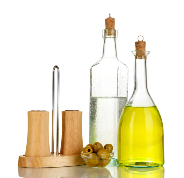 Original glass bottles with salad dressing isolated on white - Foto, afbeelding