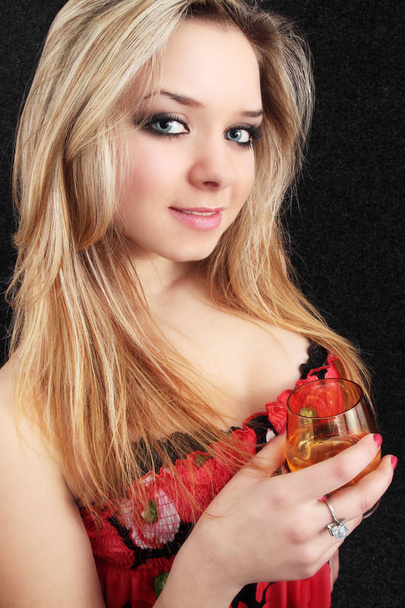 Blond to drink alcoholic beverage the cognac - Фото, изображение