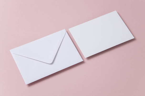 Blank white card with paper envelope template mock up - Fotó, kép