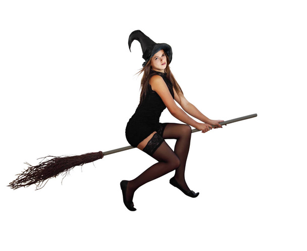 Piękna czarownica długowłosy, latanie na miotle - Zdjęcie, obraz