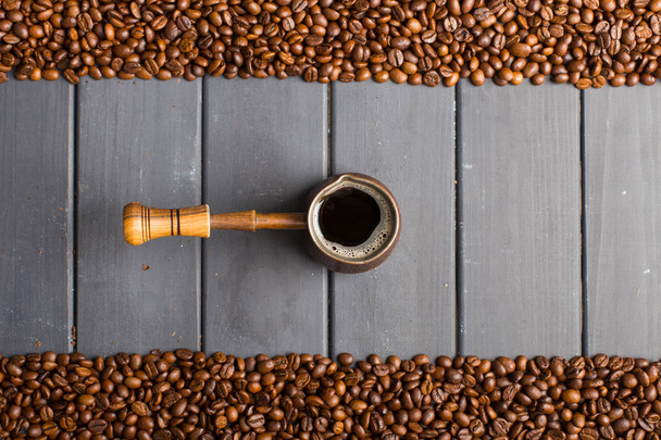 black coffee beans on black background - 写真・画像