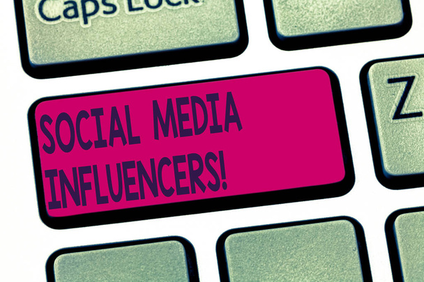 Conceptual hand writing showing Social Media Influencers. Business photo text showing who have a reputation for their knowledge Keyboard key Intention to create computer message idea. - Photo, Image