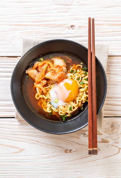 Korean instant noodles with kimchi and egg - Korean ramen style - Photo, image