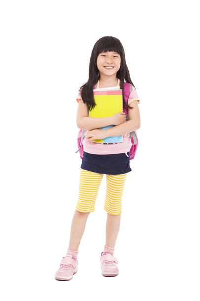 full length of asian little girl standing and holding books - Φωτογραφία, εικόνα