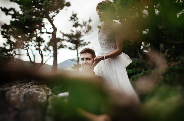 just married couple posing outdoors on their wedding photo - session - Fotó, kép