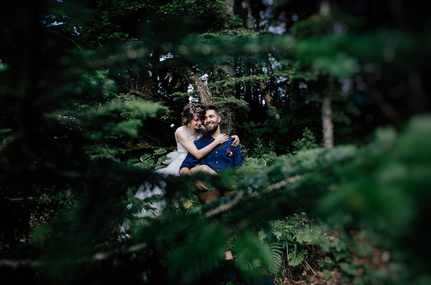 just married couple posing outdoors on their wedding photo - session - Fotoğraf, Görsel