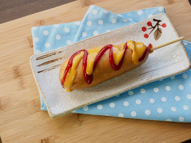 Ketchup and mustard sauce over hot dogs - Photo, Image