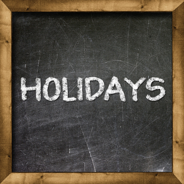 holidays handwritten on blackboard - Foto, Imagem