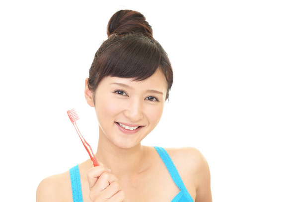 femme avec une brosse à dents - Photo, image