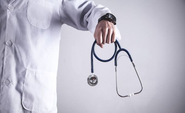 Doctor holding stethoscope. Health and Medical concept - Photo, Image