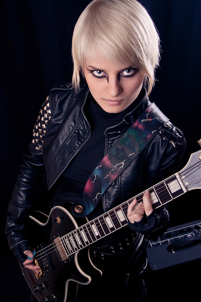 Girl with electric guitar - 写真・画像