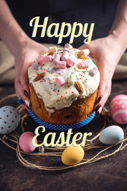 Traditional Easter cakes and colorful eggs and text on a dark background. Concept holiday card - Photo, Image