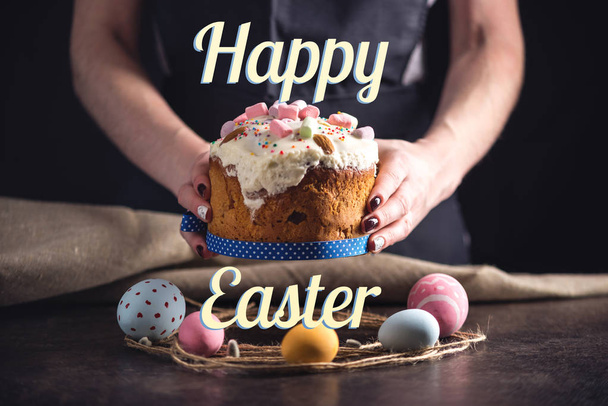 Traditional Easter cake and colorful eggs and text in rustic style. Concept holiday card - Fotó, kép