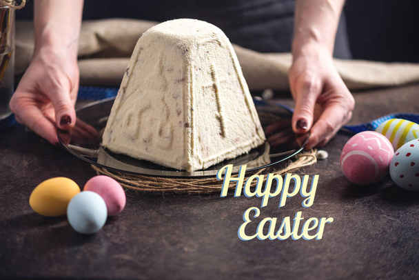 A card with traditional Easter cakes and colorful eggs and text on a dark background. Happy Easter - Photo, Image