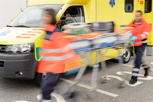 Running blurry paramedics team with stretcher - Fotó, kép