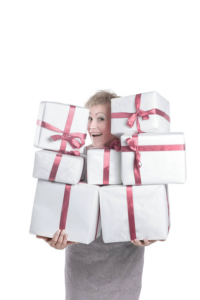 closeup.beautiful woman with gift boxes.isolated on a white - Фото, изображение