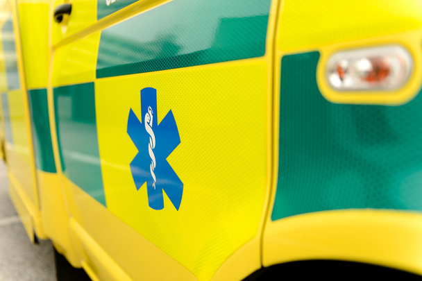 Paramedic symbol on yellow ambulance car - Foto, Imagem