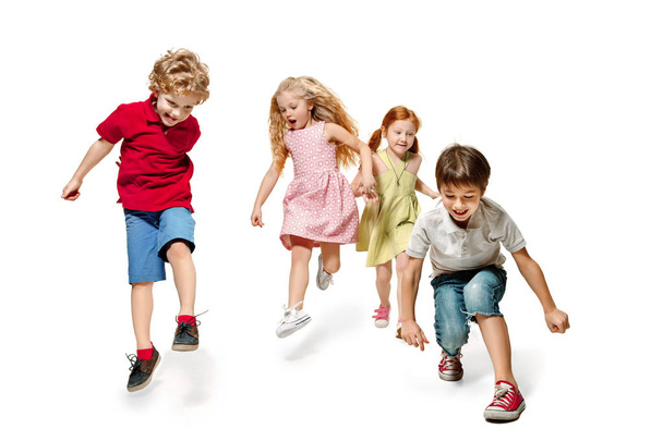 Group of fashion cute preschooler kids friends running together - Photo, image