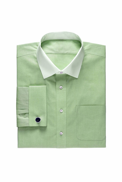 Chemise homme unie verte à la mode avec col blanc et bouton de manchette cher isolé sur un fond blanc
 - Photo, image