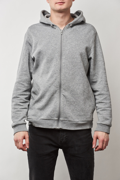cropped view of man in grey hoodie with copy space isolated on white - Valokuva, kuva